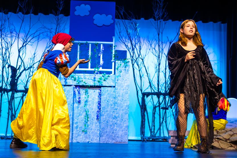 Students perform onstage